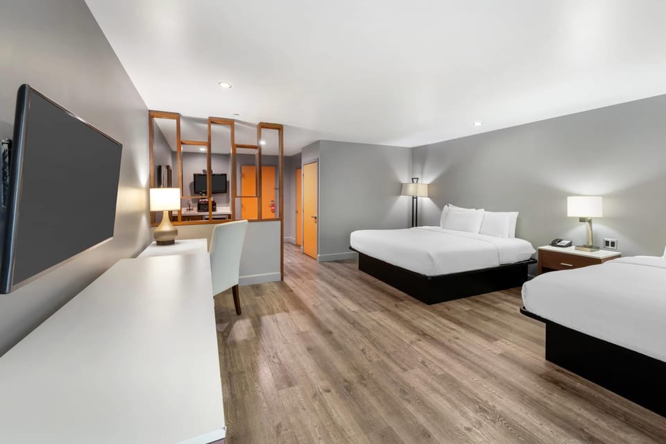 2 King Beds, Suite, Nonsmoking | Premium bedding, desk, iron/ironing board, free WiFi