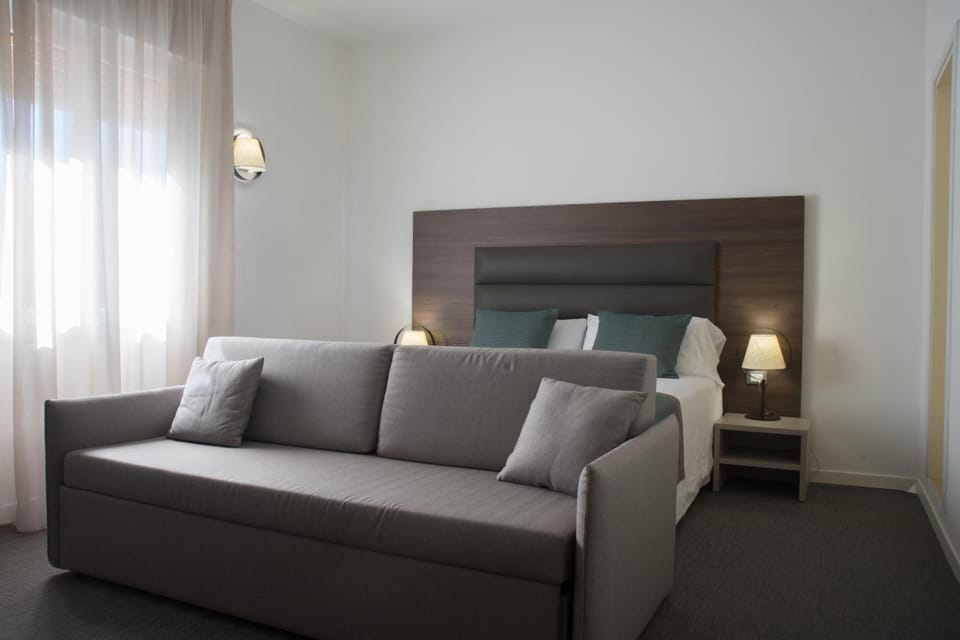 Basic Quadruple Room | Down comforters, minibar, desk, WiFi (free)