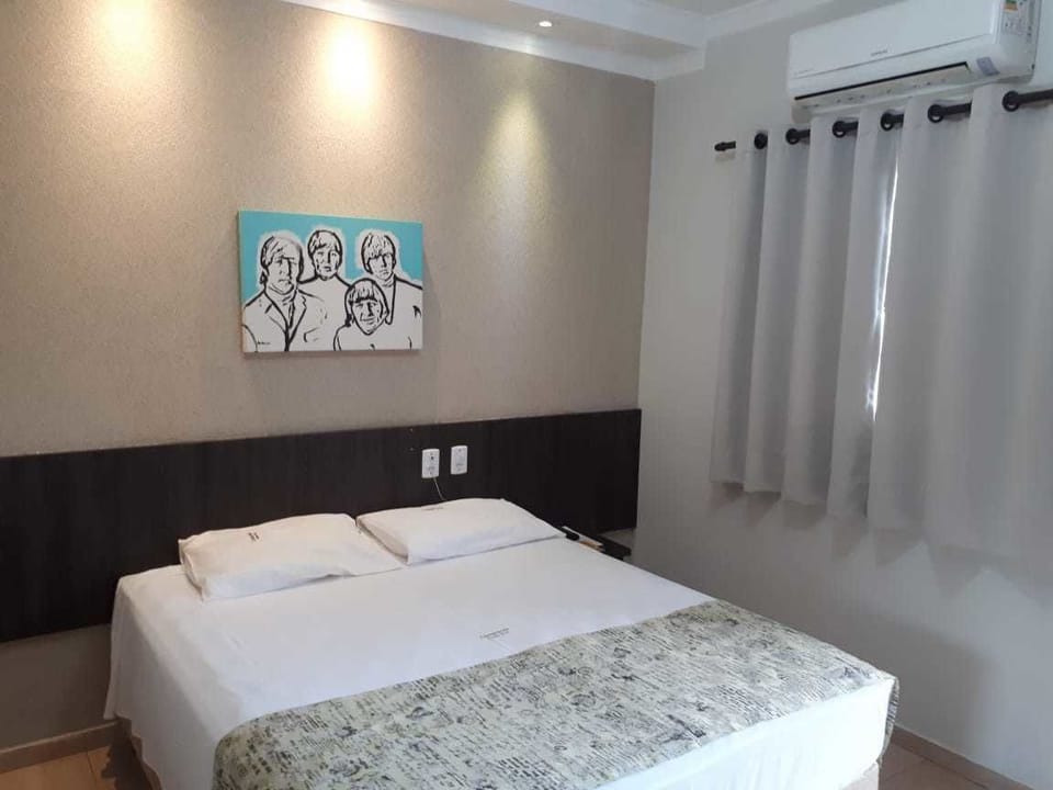 Minibar, desk, blackout drapes, iron/ironing board