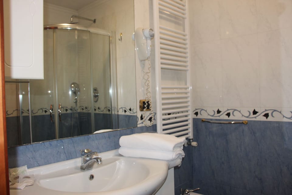 Free toiletries, hair dryer, slippers, bidet