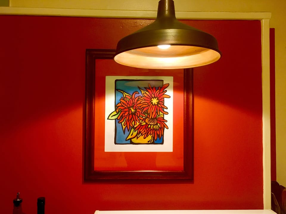 The house is adorned with original works of art by local and family artists.