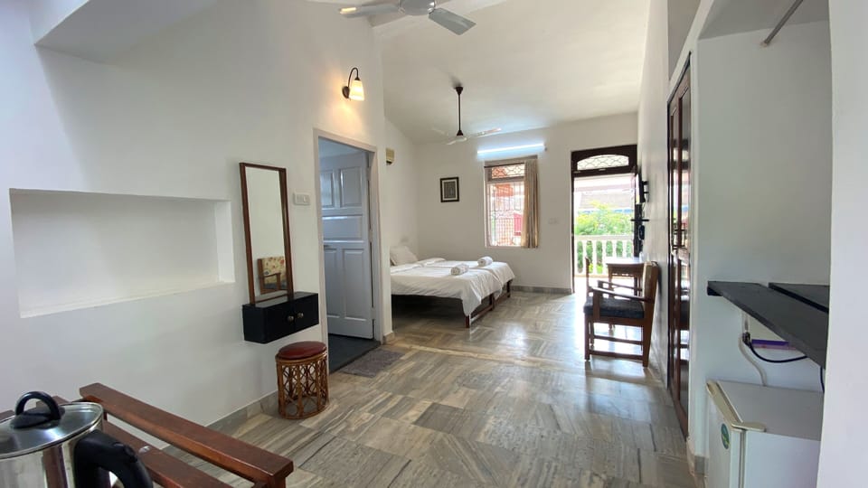 Deluxe Room, Garden View | Individually furnished, desk, laptop workspace, blackout drapes