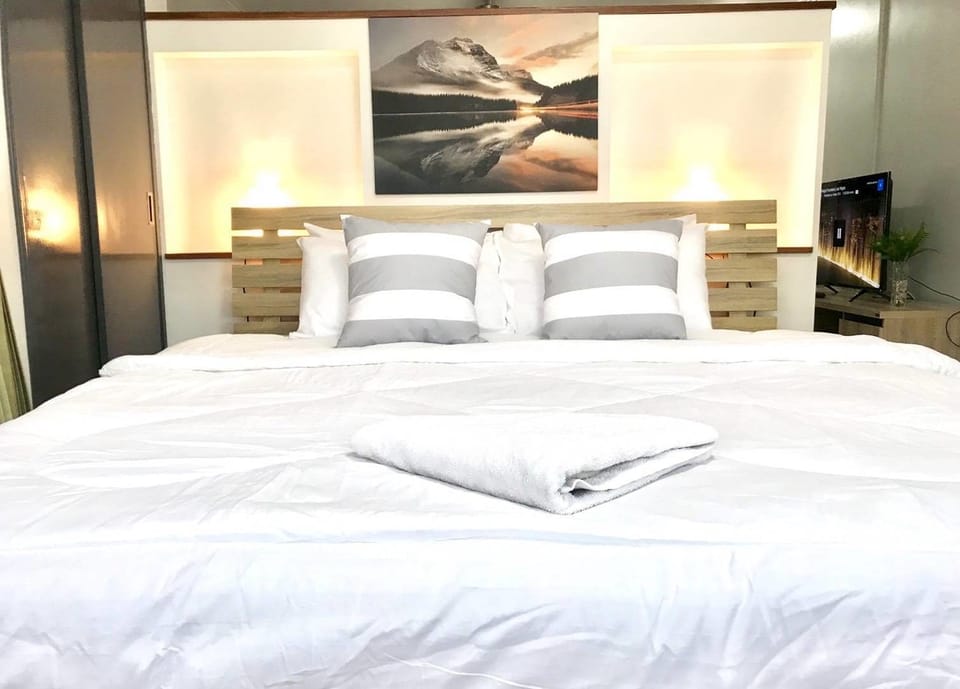 Superior Condo, 1 Bedroom, Non Smoking, City View | Desk, iron/ironing board, free WiFi, bed sheets