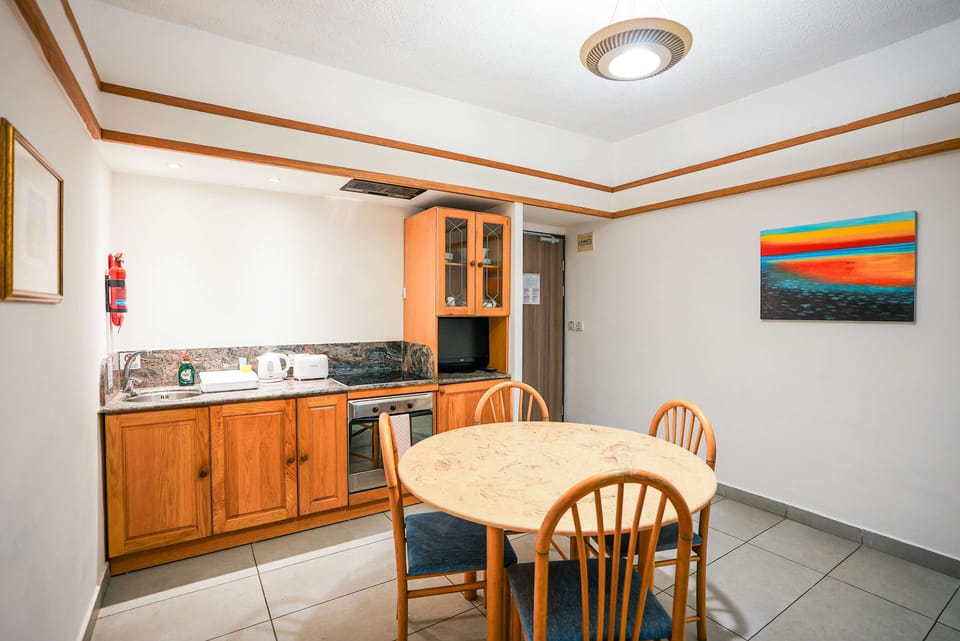 Standard Apartment, 2 Bedrooms | Desk, laptop workspace, blackout drapes, iron/ironing board