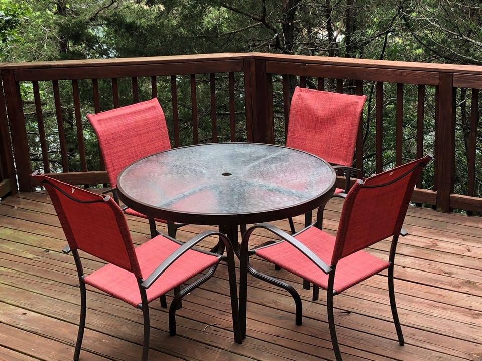 Patio table and chairs to enjoy eating outside and enjoying the views
