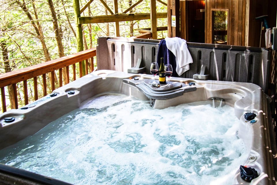Relax in the soothing water of the hot tub.