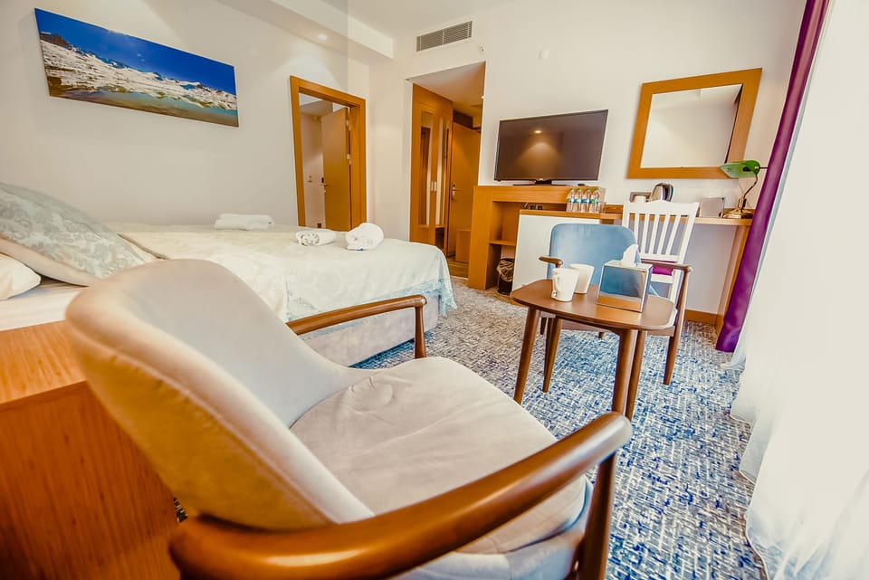 Premium bedding, down comforters, memory foam beds, minibar