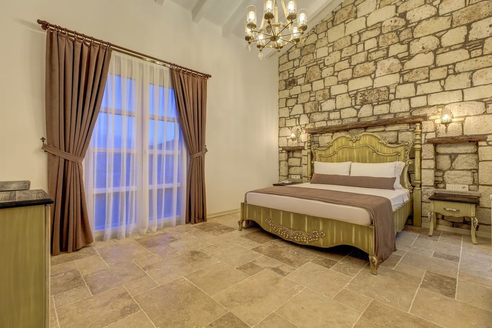 Luxury Suite, 1 Queen Bed, Jetted Tub, Pool View | Minibar, in-room safe, desk, soundproofing