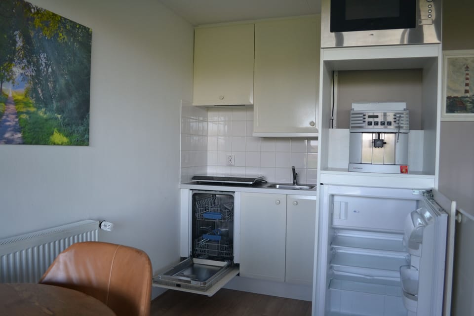 Comfort Apartment, 1 Bedroom | Private kitchen | Full-size fridge, stovetop, espresso maker, coffee/tea maker