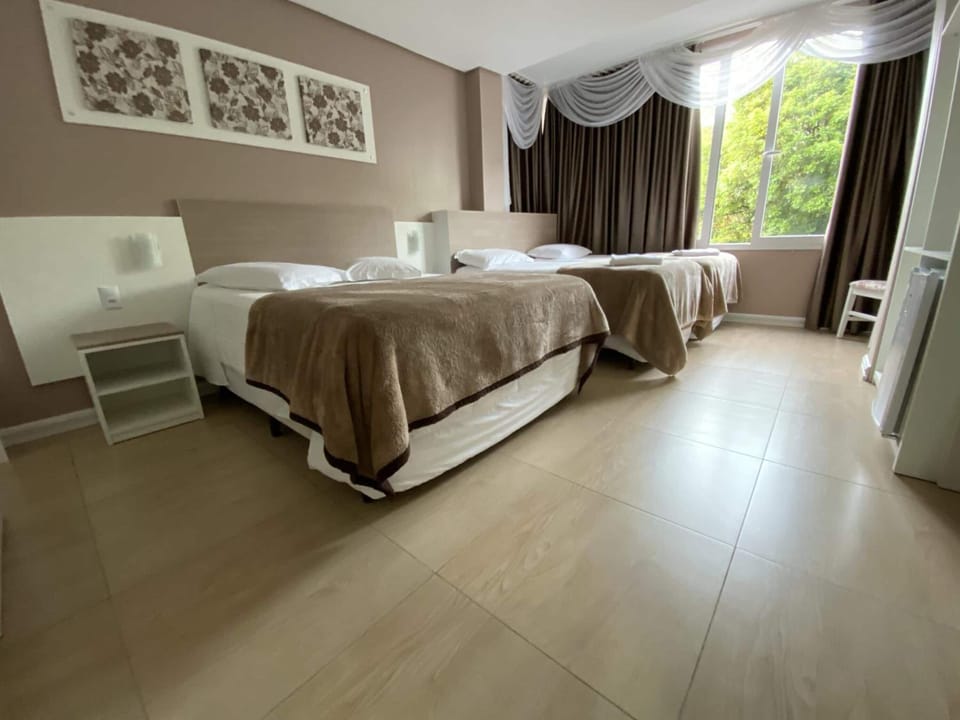 Luxury Quadruple Room, 1 Bedroom, Private Bathroom | Blackout drapes, free WiFi, wheelchair access