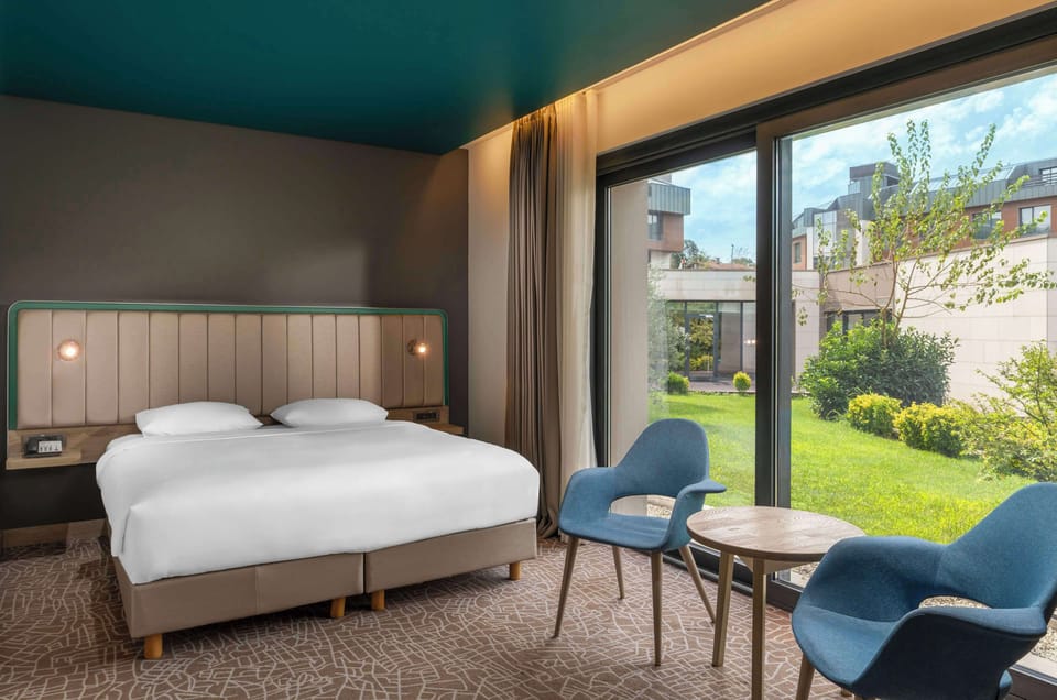 Premium bedding, down comforters, minibar, in-room safe