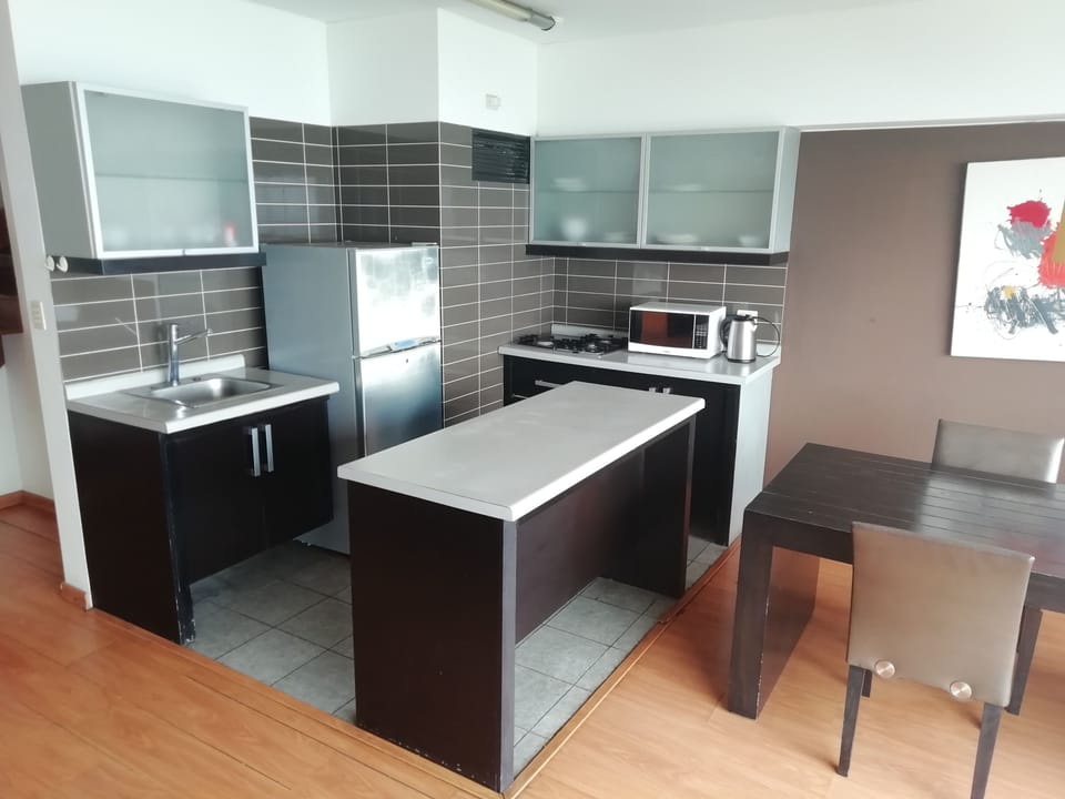 Apartment, 1 Bedroom, Ocean View | Private kitchen | Coffee/tea maker, fridge, microwave, electric kettle