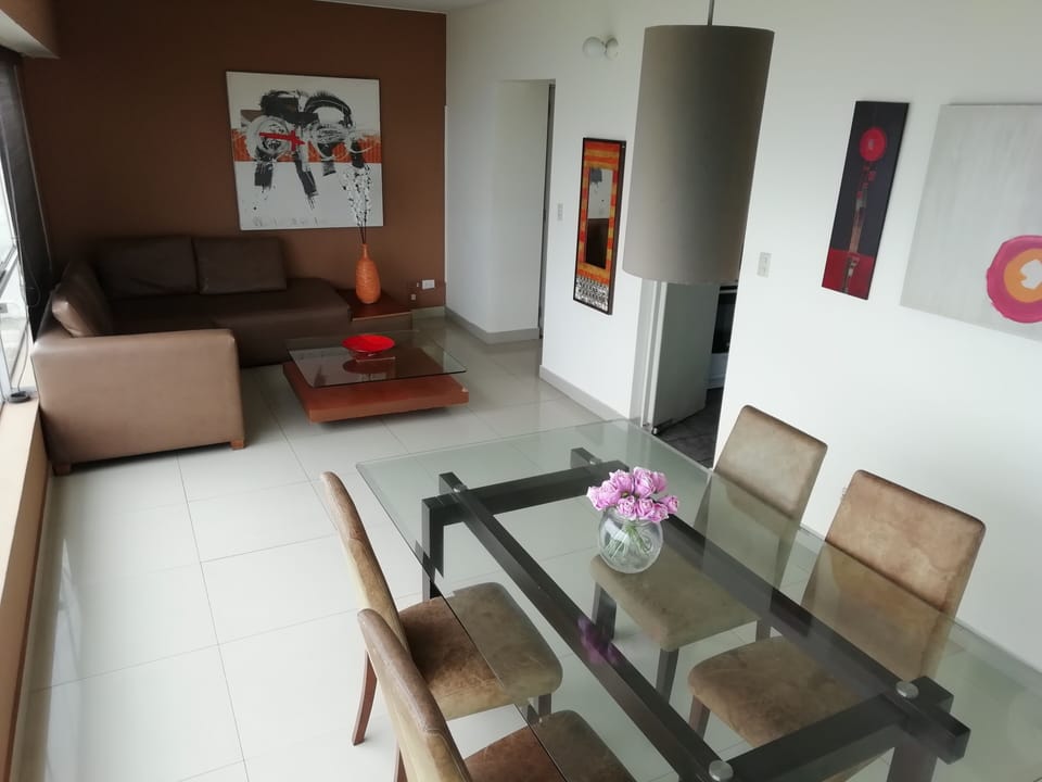 Apartment, 2 Bedrooms, Ocean View | Living room | Flat-screen TV