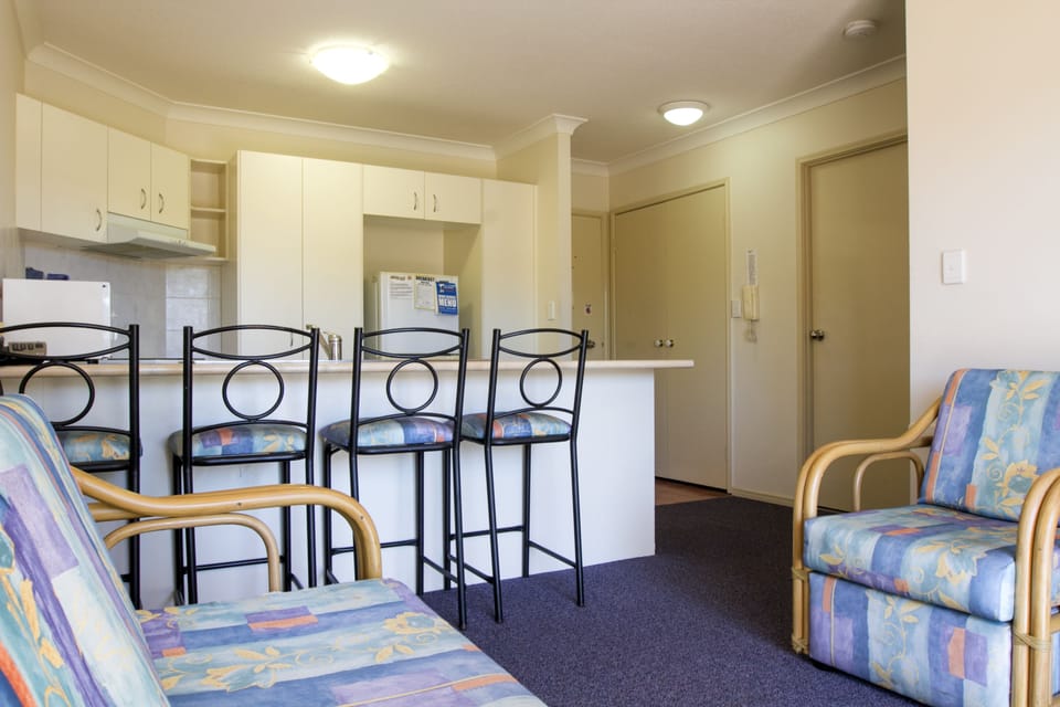 Apartment, 1 Bedroom | Living area | Flat-screen TV