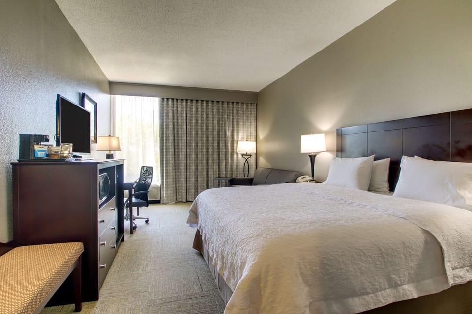 Pillowtop beds, desk, blackout drapes, iron/ironing board