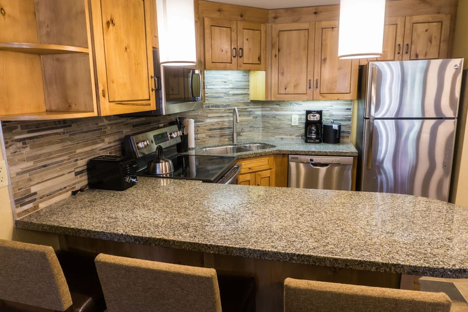 Condo, 1 Bedroom | Private kitchen | Full-size fridge, microwave, oven, stovetop