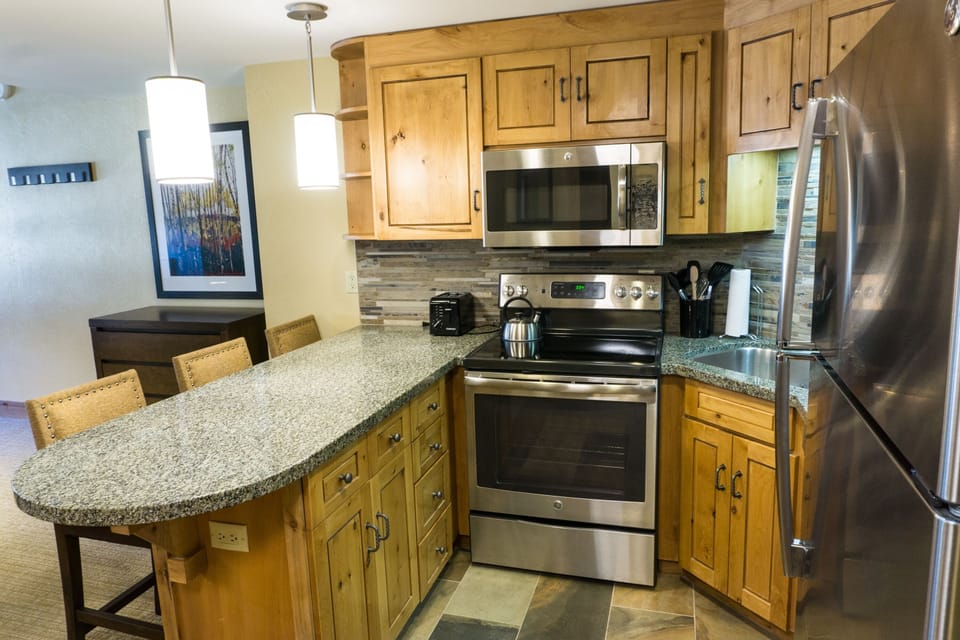 Condo, 1 Bedroom | Private kitchen | Full-size fridge, microwave, oven, stovetop