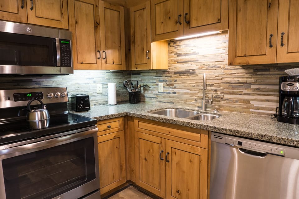 Condo, 1 Bedroom | Private kitchen | Full-size fridge, microwave, oven, stovetop