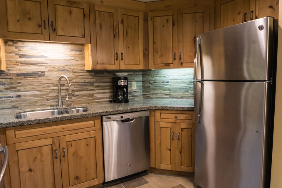 Condo, 1 Bedroom | Private kitchen | Full-size fridge, microwave, oven, stovetop