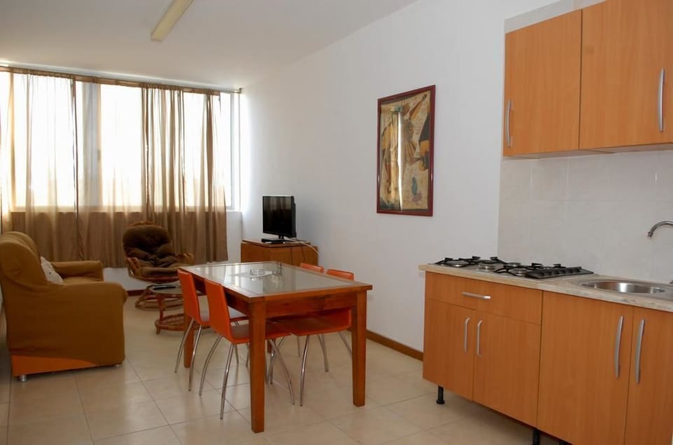 Apartment, 1 Bedroom | Living area | Flat-screen TV