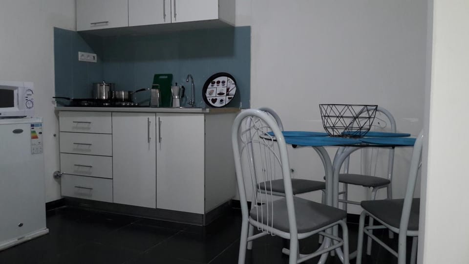 Fridge, microwave, stovetop, cookware/dishes/utensils