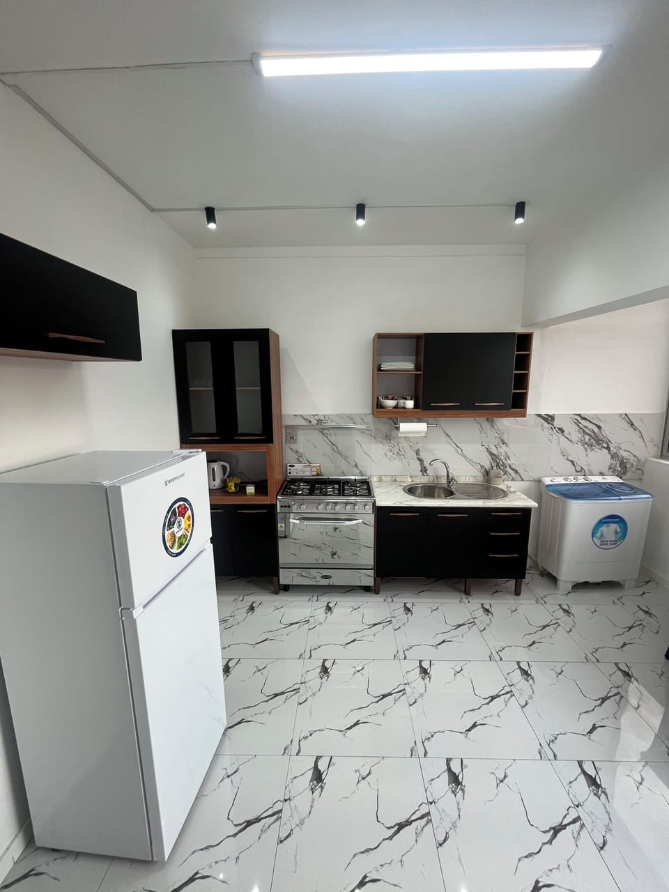 Apartment, 2 Bedrooms | Private kitchen | Fridge, microwave, stovetop, cookware/dishes/utensils
