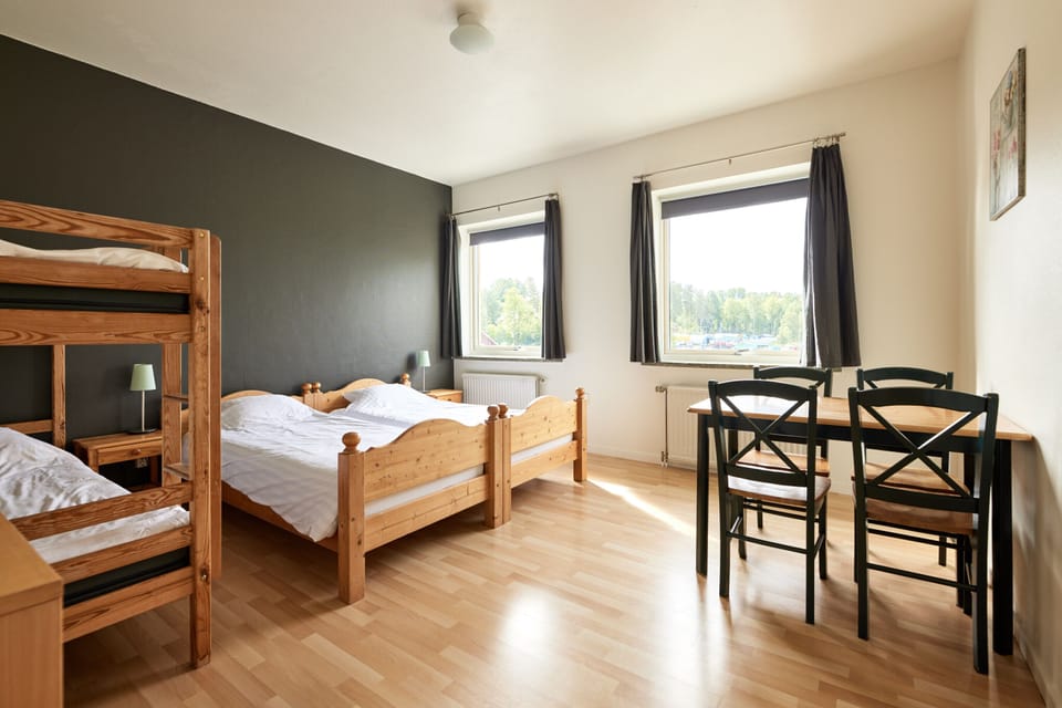 Blackout drapes, cribs (surcharge), WiFi (free), bed sheets