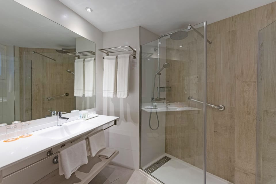 Shower, free toiletries, hair dryer, towels