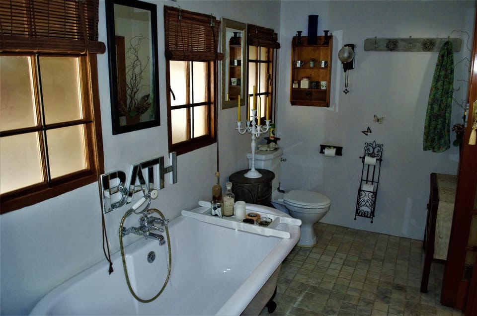 Luxury Suite, 1 Bedroom | Bathroom | Shower, rainfall showerhead, designer toiletries, hair dryer