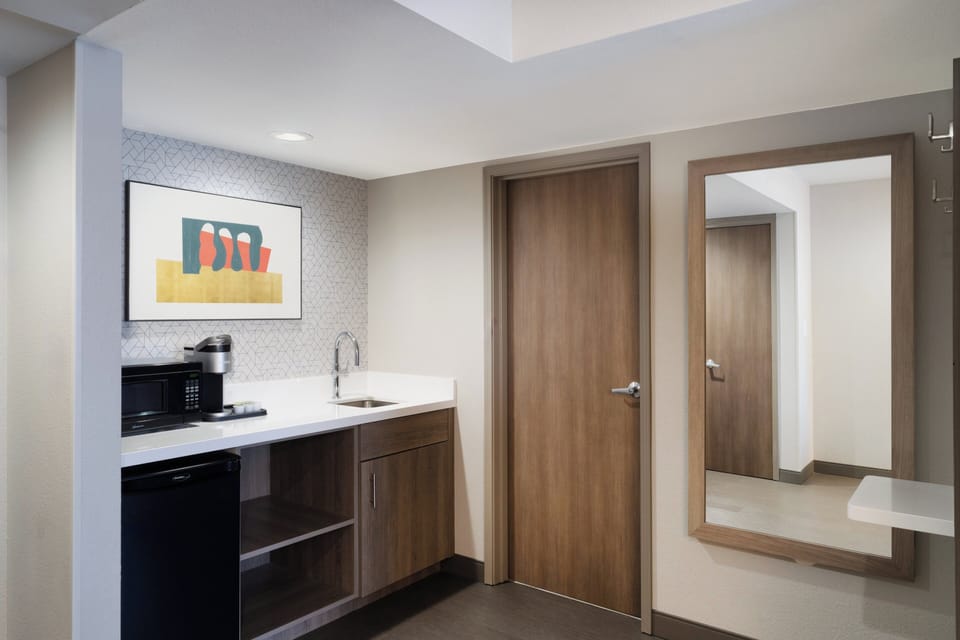 Suite, 1 King Bed | In-room safe, desk, iron/ironing board, free WiFi