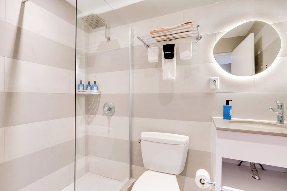 Shower, hair dryer, bathrobes, towels