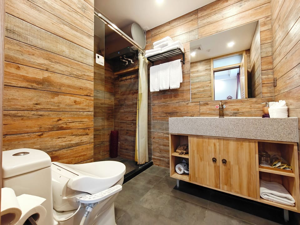 Family Triple Room | Bathroom | Shower, free toiletries, hair dryer, slippers