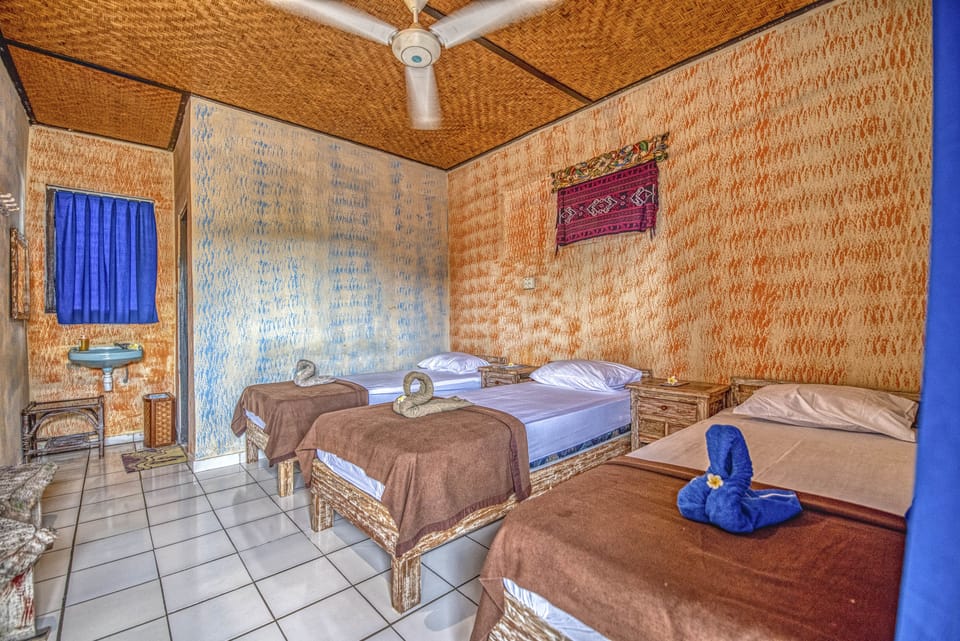 Economy Triple Room, 3 Twin Beds | Bed sheets