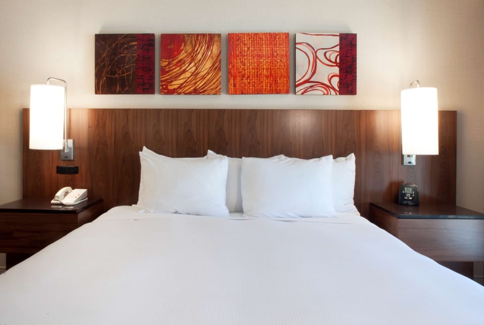 Premium bedding, down comforters, pillowtop beds, in-room safe