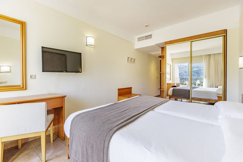 Standard Double Room, Balcony | Desk, blackout drapes, free WiFi, bed sheets