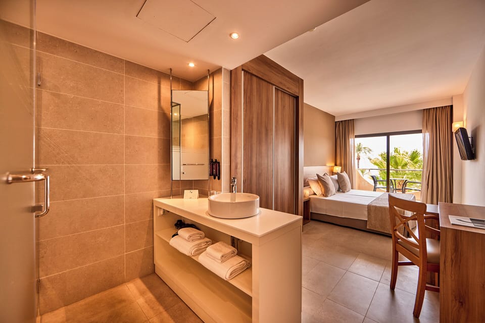 Double Room, Balcony, Sea View | Bathroom | Shower, eco-friendly toiletries, hair dryer, towels