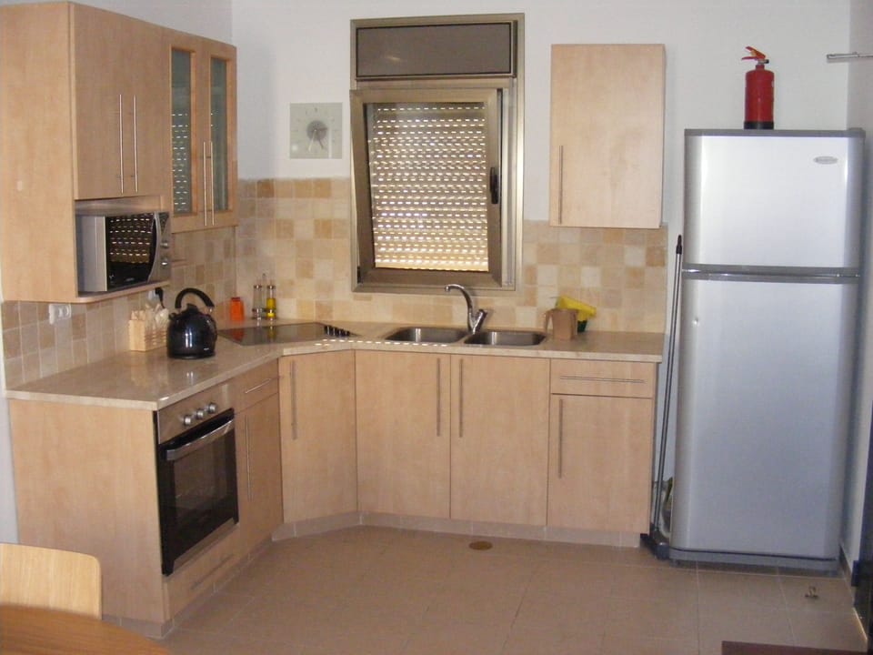 Family Suite, 2 Bedrooms | Private kitchen | Coffee/tea maker, microwave, oven, electric kettle