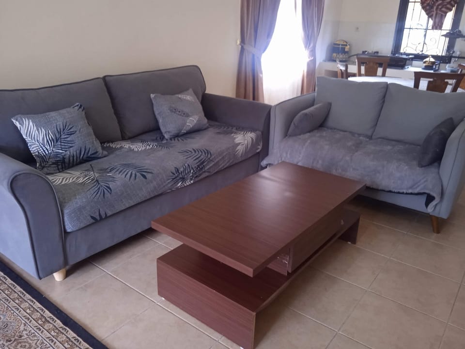 Deluxe Villa, 2 Bedrooms, Smoking, Garden View | Living area | 40-inch Smart TV with digital channels, TV