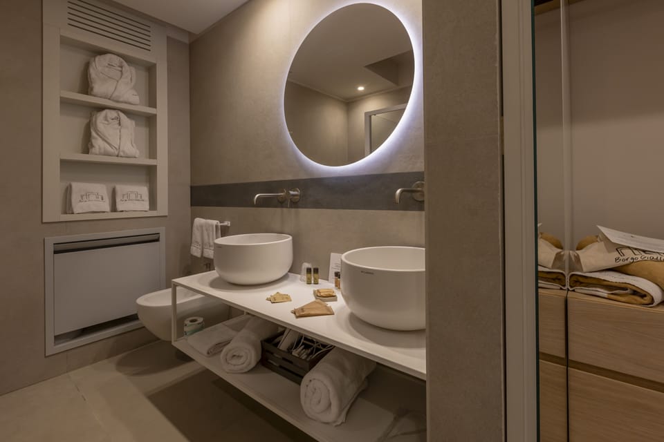 Royal Suite, 1 Queen Bed, Partial Sea View | Bathroom | Shower, free toiletries, hair dryer, bathrobes