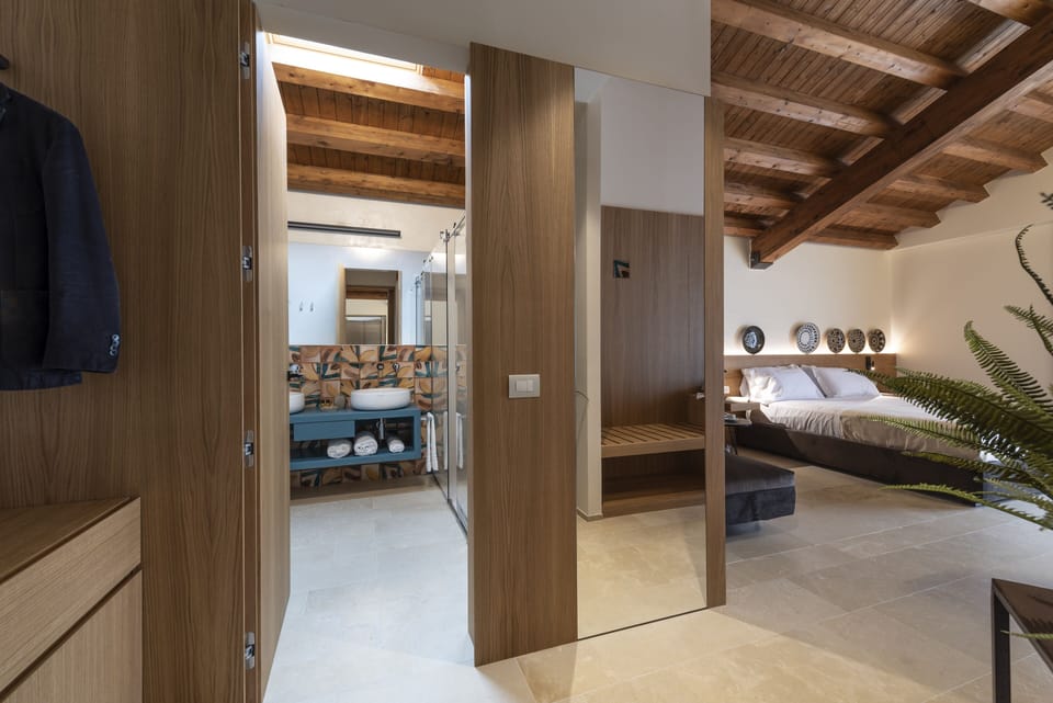 Junior Suite, Sea View | Living area | Flat-screen TV