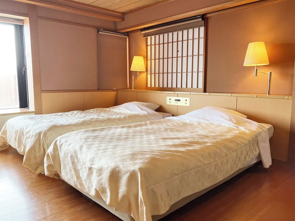 Disability-Access Twin Room with Open Air Bath - Non-Smoking | In-room safe, desk, bed sheets