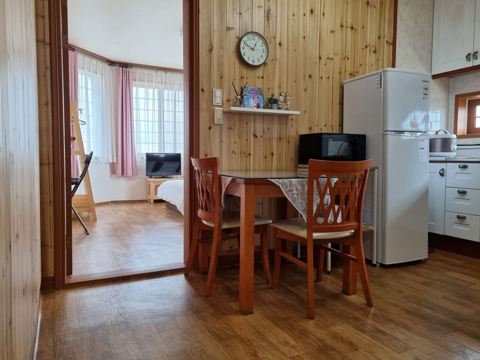 Family Double or Twin Room, 2 Queen Beds, Non Smoking, Partial Sea View | Private kitchen | Full-size fridge, microwave, stovetop, electric kettle