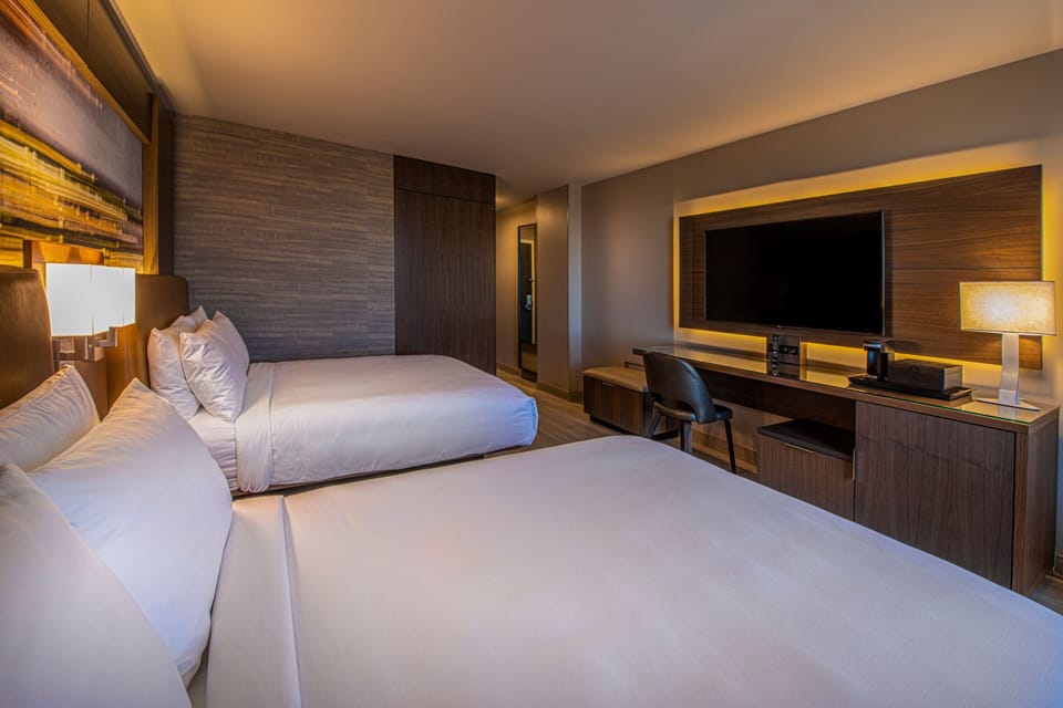 Hypo-allergenic bedding available, pillowtop beds, in-room safe, desk