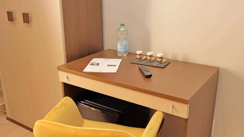 Triple Room private balcony | Minibar, in-room safe, desk, soundproofing