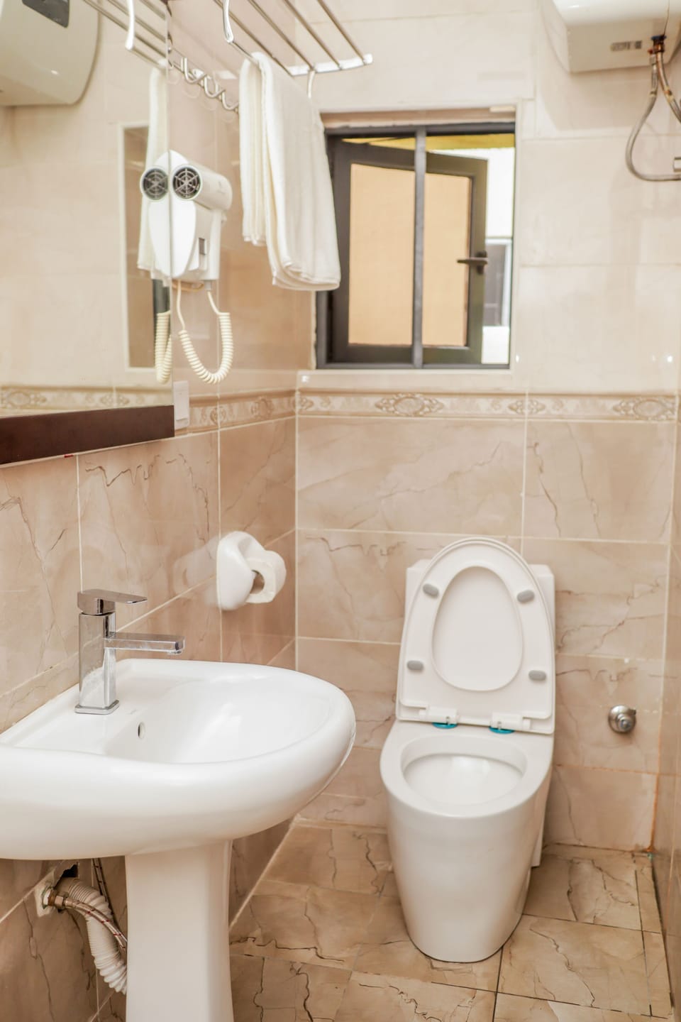 Deep soaking tub, rainfall showerhead, free toiletries, towels
