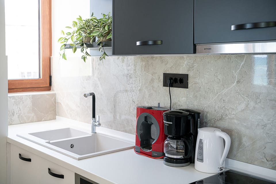 Apartment, Sea View, Beachfront | Private kitchen | Full-size fridge, microwave, oven, stovetop