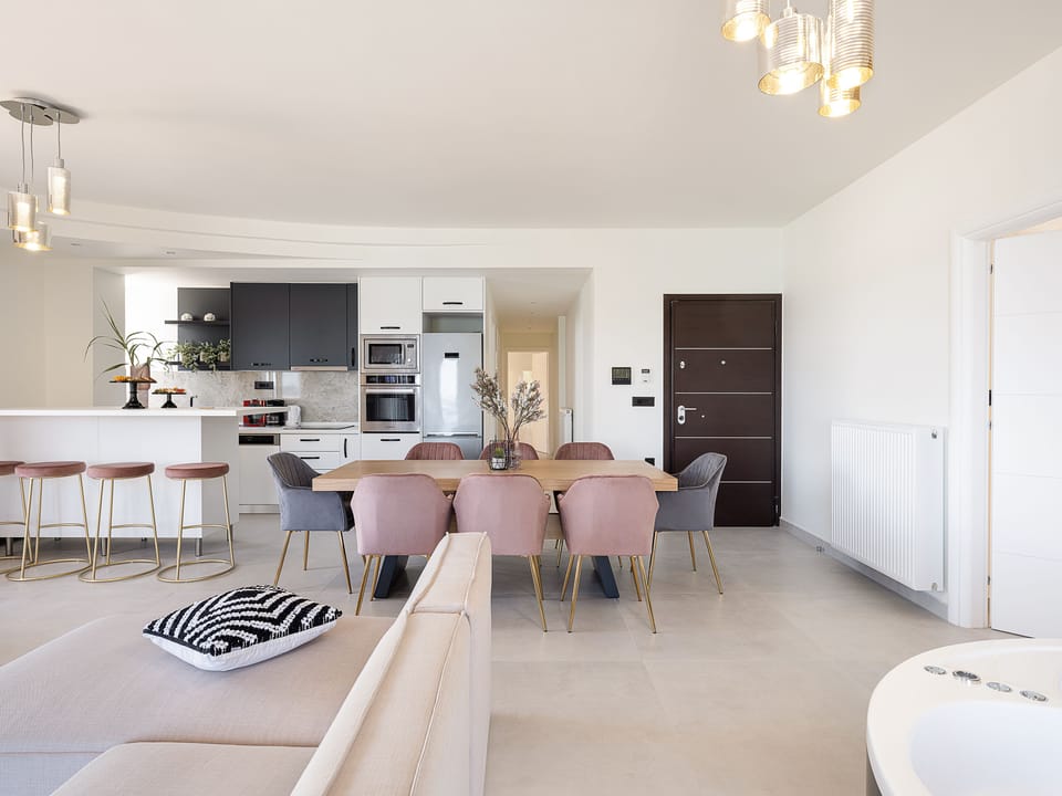 Apartment, Sea View, Beachfront | Living area | Flat-screen TV, fireplace