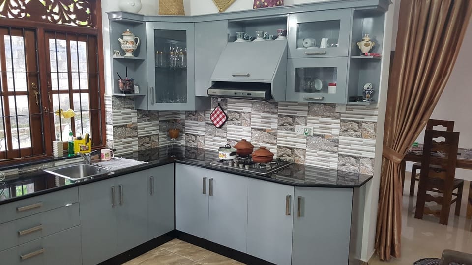 Deluxe Room, 1 Bedroom, Smoking, Garden View | Private kitchen | Shared fridge, electric kettle, highchair
