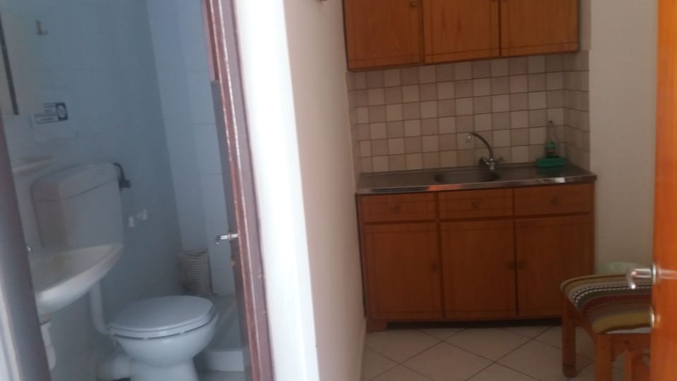 Standard Triple Room, Partial Sea View | Iron/ironing board, bed sheets