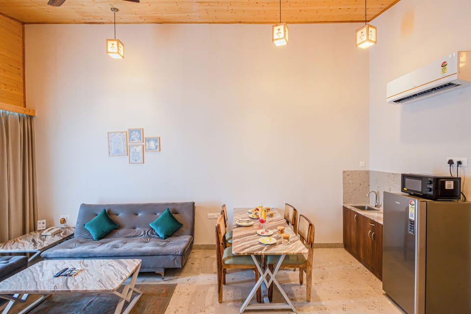Sajjan Villa with 2-bedrooms and Jacuzzi - Hi Tea &amp; Adventure access | Living room | Flat-screen TV, toys